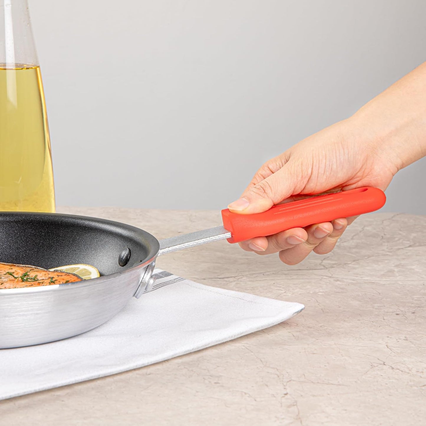 Restaurantware Pan Handle Sleeve 1 Pack Of 4.25" Removable Silicone Pot Handle Holder Fits 8-inch And 9-inch Pans No-Slip Heat-Resistant Dishwashable Red Aluminum Fry Pan Covers for Home Kitchen