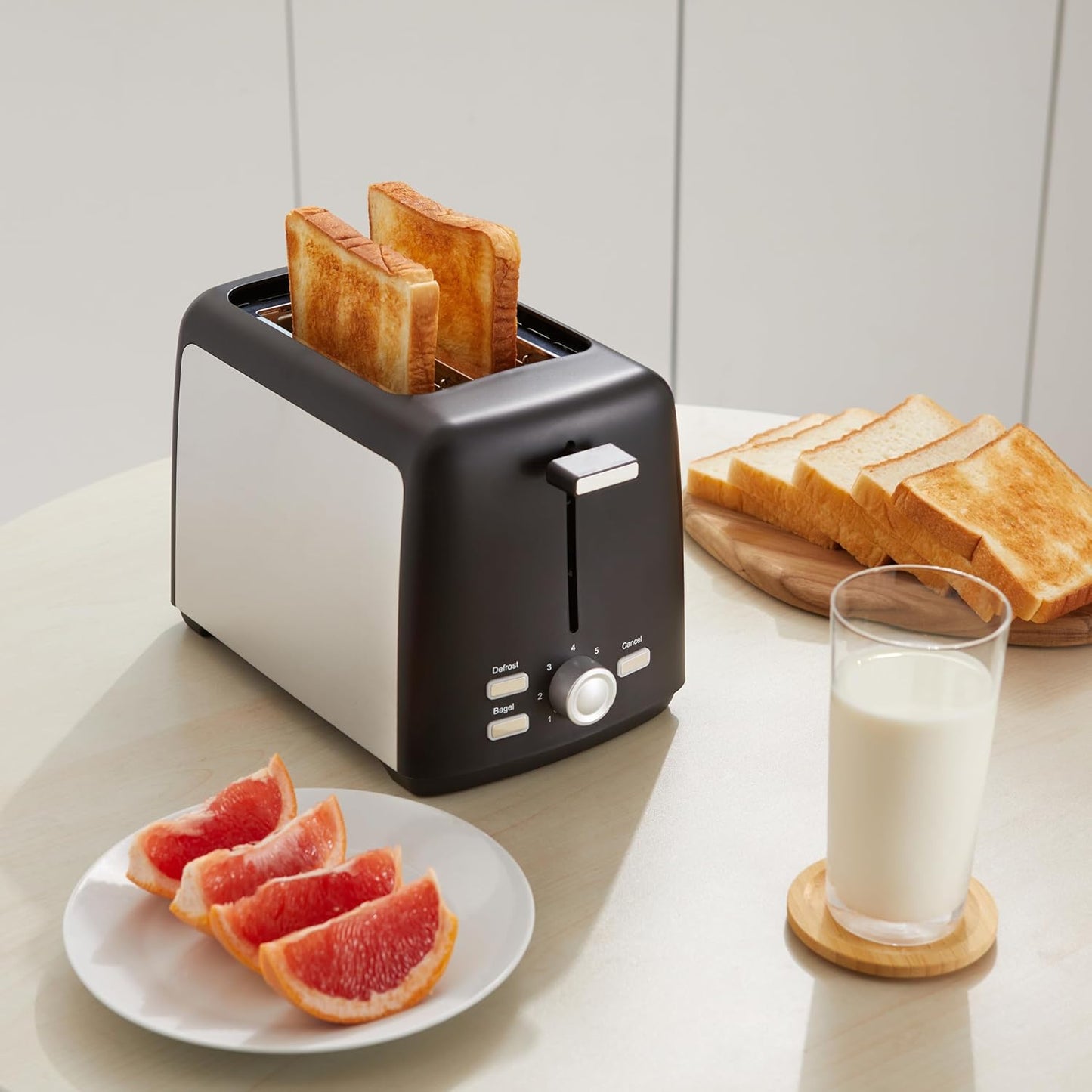 Amazon Basics 2 Slice Toaster, With 7 Browning Settings, Extra Wide Slots For Bagels and Special Breads, Removable Easy-to-Clean Crumb Trays, Cancel/Defrost/Bagel Buttons, 800W, Black & Silver