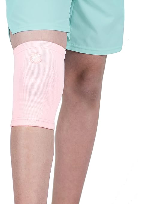 KARM Kids Knee Brace Sleeve - Youth Knee Compression Sleeve for Kids, Child - Support for Pain, Sports, Football, Basketball, Gymnastics, Recovery, Boys & Girls (Light Pink)