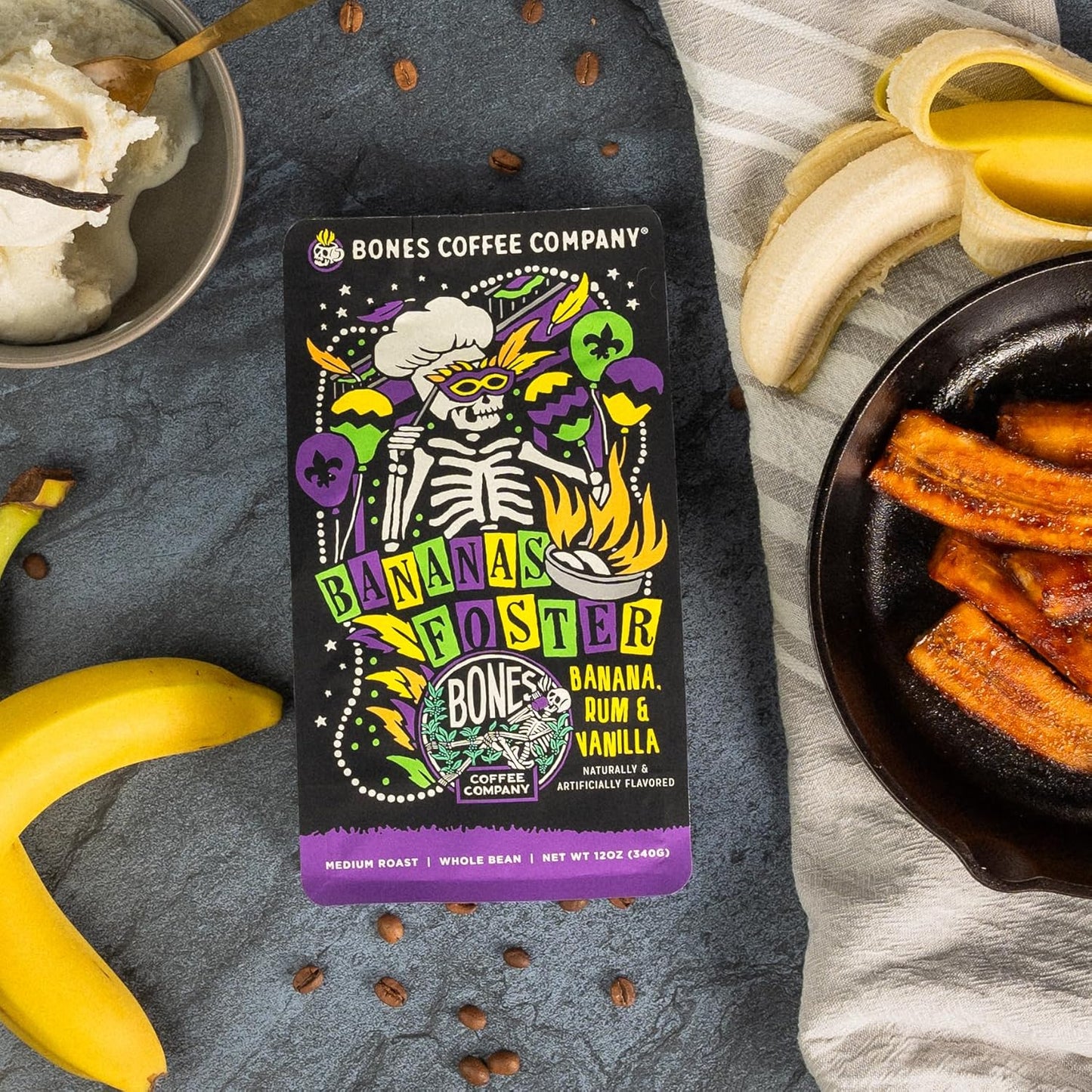 Bones Coffee Company Bananas Foster, Banana, Rum and Vanilla Flavored Coffee, Medium Roast Low Acid Arabica Beans Compatible with Auto drip and French Press Coffee Maker, 12 Oz Ground