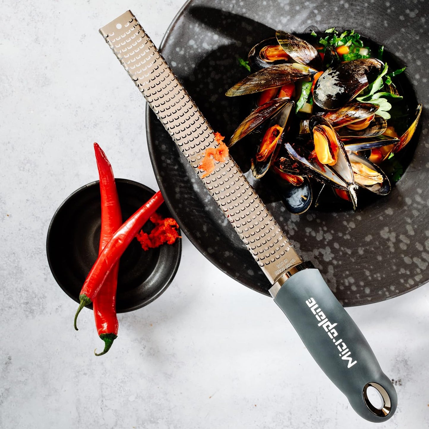 Microplane Premium Zester Grater in After Dark Gray | Lemon Zester tool, Hard Cheese & Vegetable Grater | For Citrus, Parmesan Cheese, Garlic, Ginger, Nutmeg | Fine Stainless Steel Blade, Made in USA